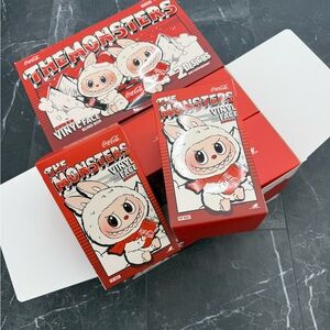 Coca-Cola The Monsters Labubu blind boxes.
